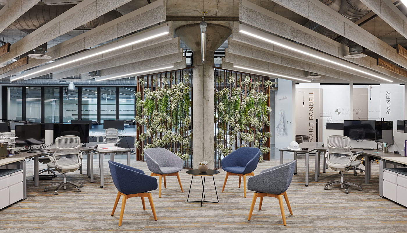 Living wall inside of DPR's Austin office space, surrounded by chairs and desks.